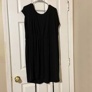 Black shift dress. Slinky. Spandex so it stretches